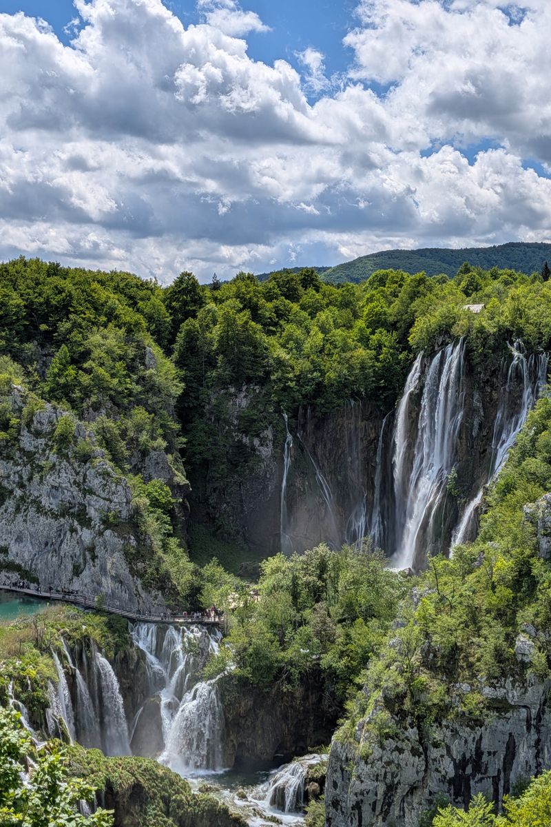 Explore the stunning waterfalls and lush greenery at Plitvice Lakes National Park.